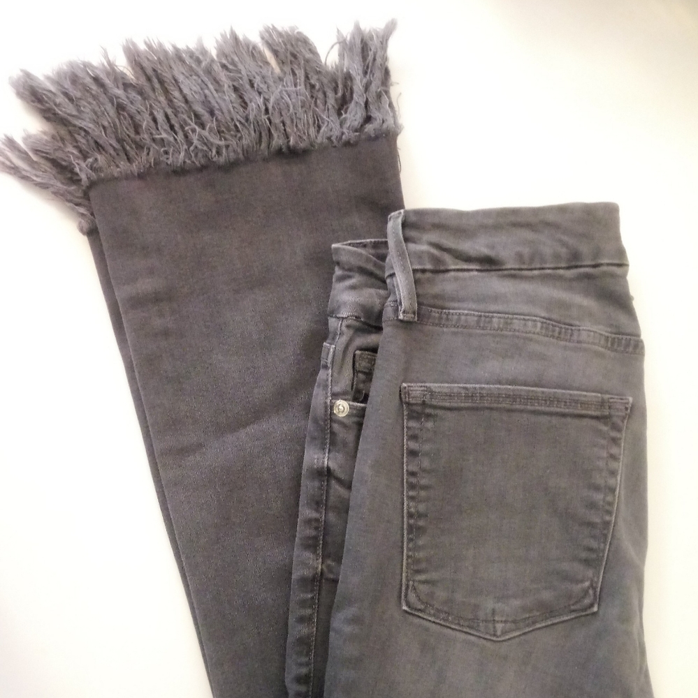 Good American high rise fringe jeans